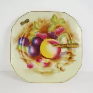Decorative Plate with Finger Handle and Fruit Design